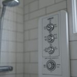 how to adjust hot water in shower